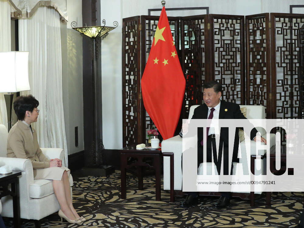 (191104) -- SHANGHAI, Nov. 4, 2019 -- Chinese President Xi Jinping meets with Chief Executive of Hong Kong Special Administrative Region (HKSAR) Carrie Lam, who is here for the second China International Import Expo (CIIE), in Shanghai, east China, Nov. 4, 2019. ) (CIIE)CHINA-SHANGHAI-XI JINPING-CARRIE LAM-MEETING (CN) JuxPeng