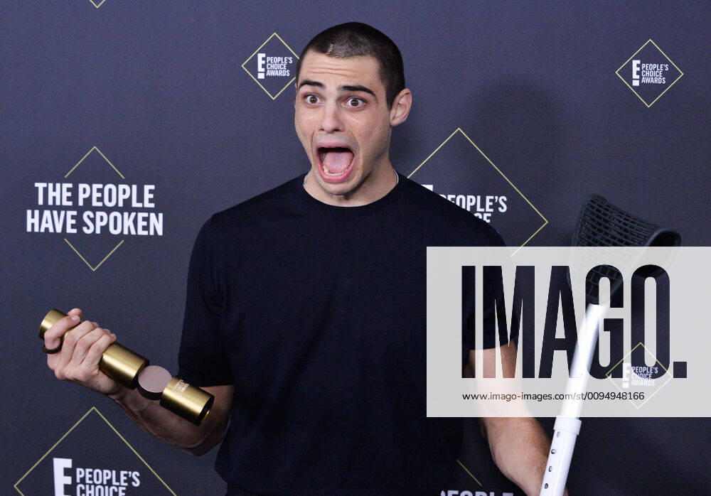 Noah Centineo appears backstage with his award for Comedy Movie Star of 2019 during the 45th annual E! People s Choice Awards at the Barker Hangar in Santa Monica, California on Sunday, November 10, 2019. LAP20191110404 JIMxRUYMEN