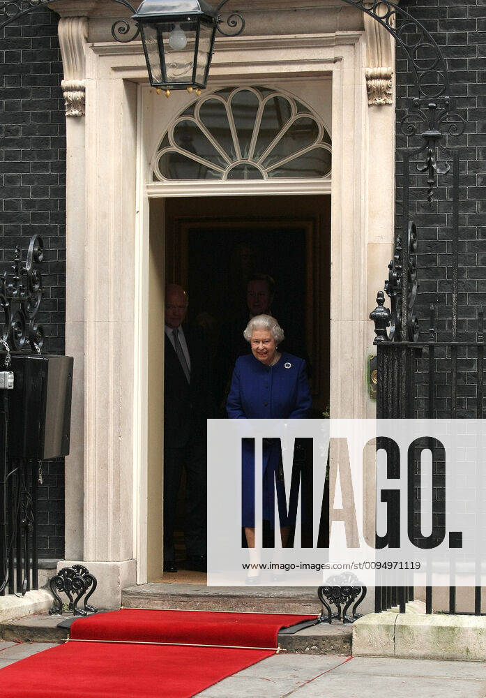 Queen Elizabeth II during a Royal Visit to Number 10 Downing Street, London, where she received a gift to mark the Diamond Jubilee and attended a Cabinet meeting as an observer.