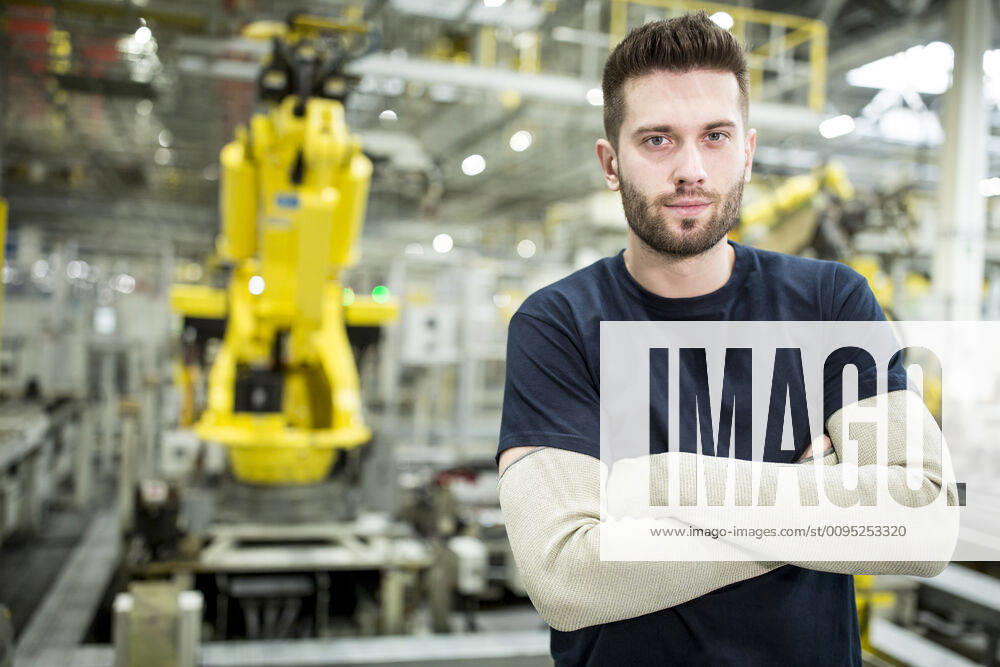 Portrait of confident worker in a modern factory model released Symbolfoto property released WESTF24306