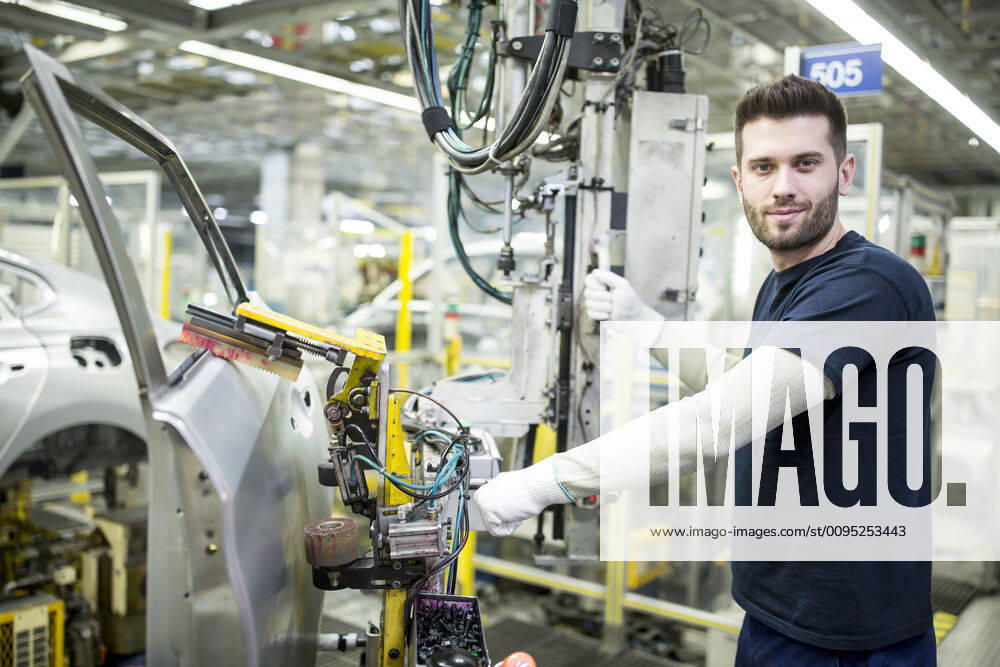 Portrait of confident worker in modern car factory model released Symbolfoto property released WESTF24334