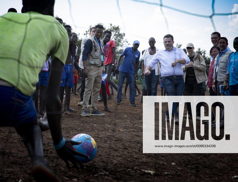 Federal Development Minister Gerd Mueller, CSU, and Federal Labour Minister Hubertus Heil play football at refugee camp Nguenyyiel, Ethiopia, 01 12 2019 Gambella Ethiopia