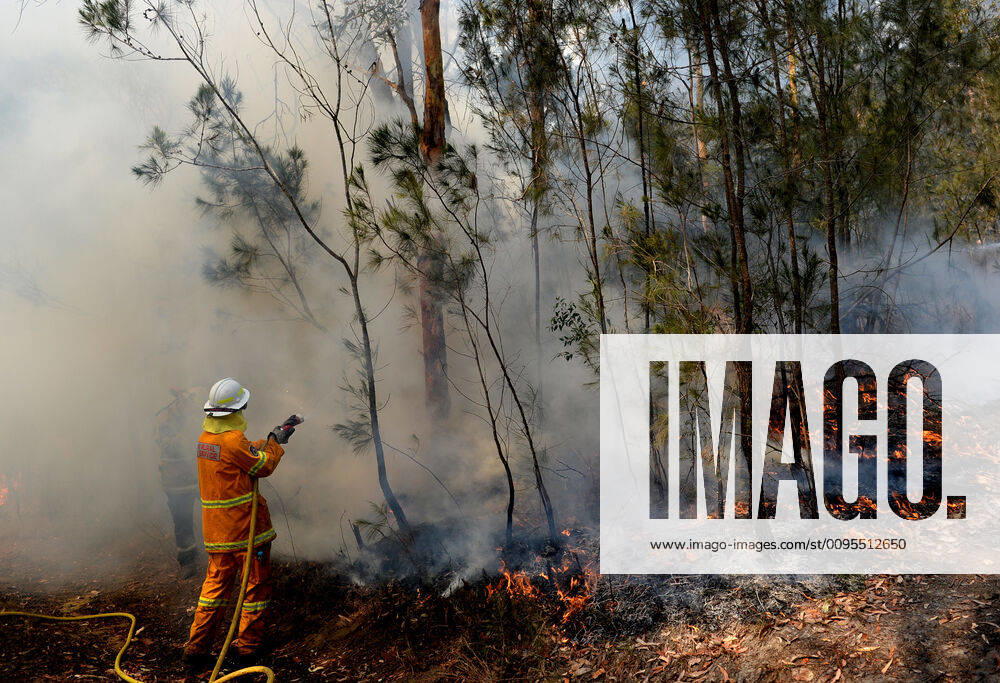 BUSHFIRES NSW, NSW Rural Fire fighters establish a backburn in Mangrove Mountain, New South Wales, Sunday, December 8, 2019. ( NO ARCHIVING, , NO USE IN BOOKS WITHOUT CONSENT CENTRAL COAST NSW AUSTRALIA
