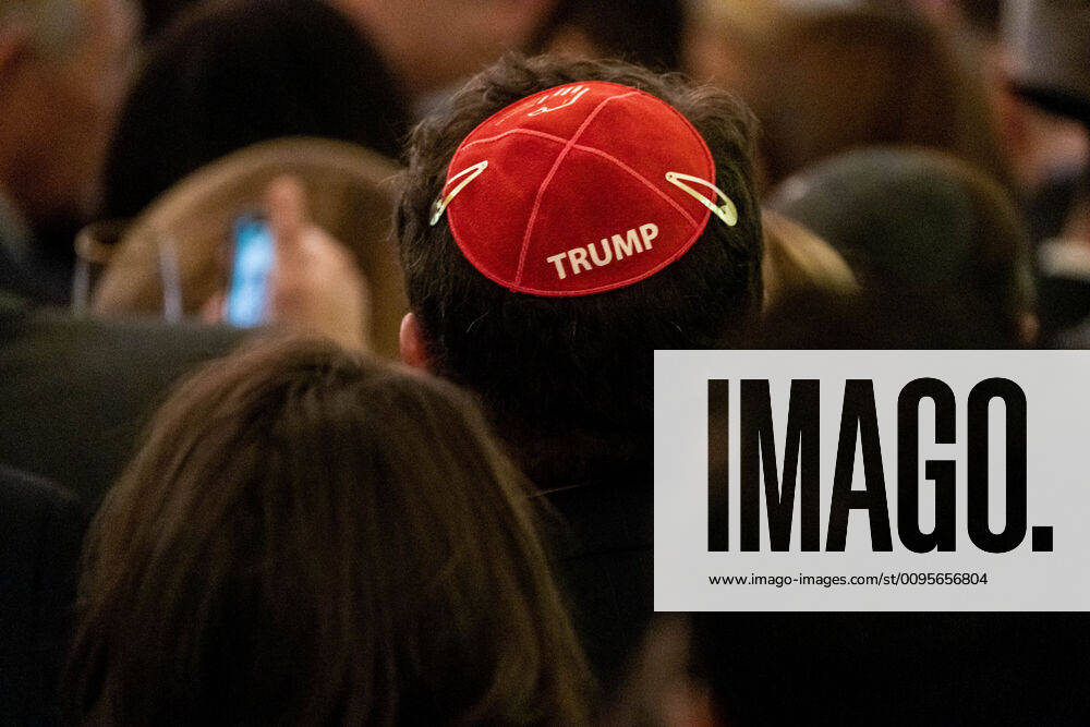 Jewish participants wearing a yamaka hat wait for President Donald J. Trump as they attend a Hanukkah Reception in the East Room of the White House in Washington, DC on Wednesday, Dec. 11, 2019. Trump then signed an Executive Order Combating Anti-Semitism. On the other end of Pennsylvania Ave., the House of Representatives is moving toward a decision whether to impeach the president. WAP20191211019 KENxCEDENO