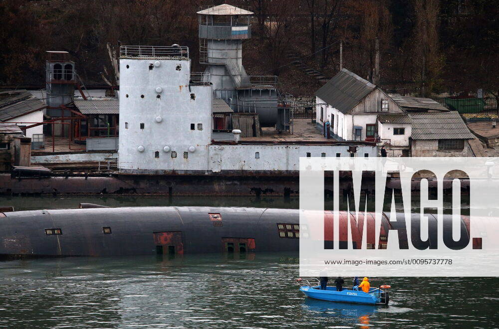 A decommissioned B-380 submarine of Russia s Black Sea Fleet risen to the surface in the Yuzhnaya Bay. The PD-16 floating dock with the submarine sank in the early hours of December 15, 2019. Sergei Malgavko TASS TS0C760E