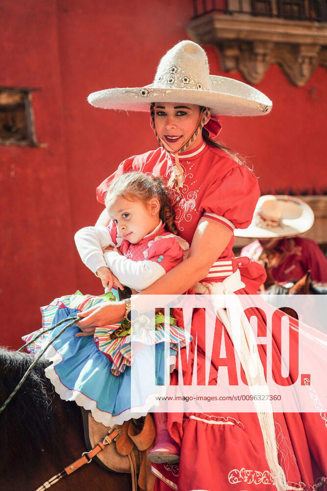 San Miguel De Allende, Guanajuato, Mexico: A Mexican Cowgirl and her daughter ride horseback in a parade to celebrate the 251st birthday of the Mexican Independence hero Ignacio Allende January 21, 2020 in San Miguel de Allende, Guanajuato, Mexico. Allende, from a wealthy family in San Miguel played a major role in the independency war against Spain in 1810 and later honored by his home city by adding his name. San Miguel De Allende Mexico - ZUMAe02_ 20200121_zaf_e02_021