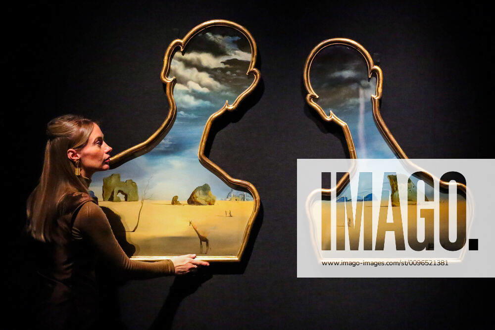 London, UK. A staff member holds Salvador Dali, Couple aux tÃªtes de pleins nuages (1937) (est Â£7m to Â£10m) at the preview of Bonhams Impressionist and Modern Art Sale. London UK - ZUMAl94_ 20200129_zaf_l94_048