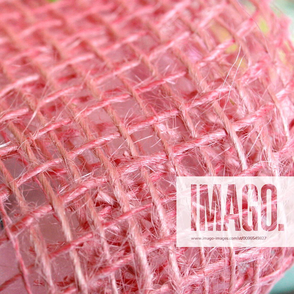 Pink ribbon Detail of a pink ribbon fabric weave