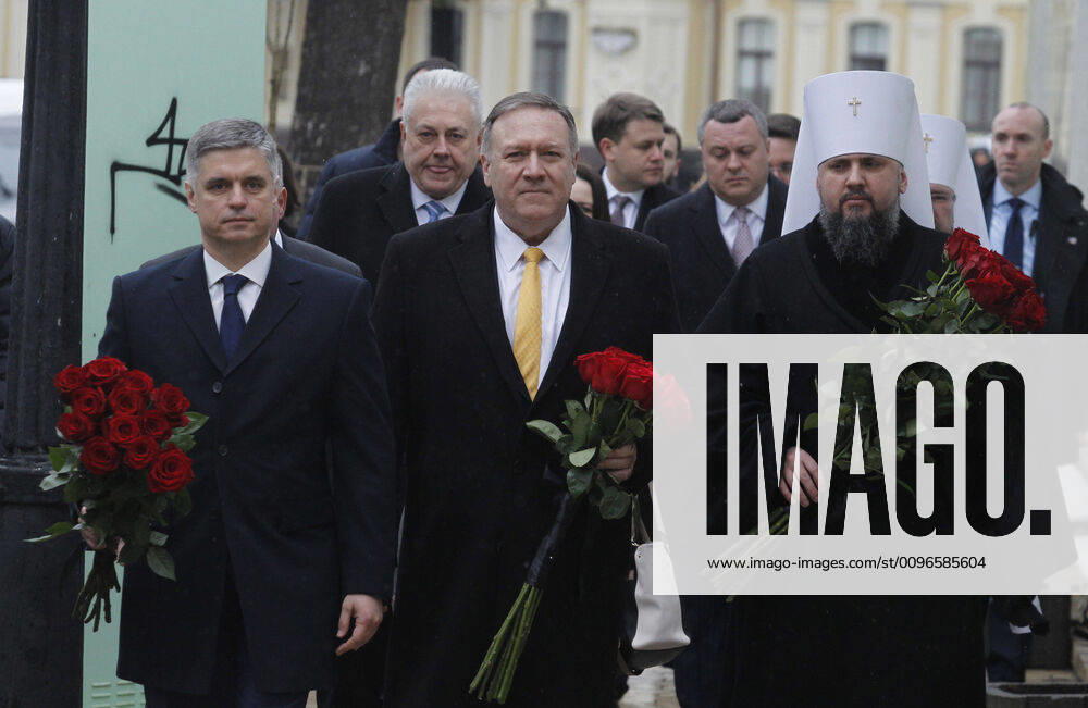 US Secretary of State MIKE POMPEO (C), Ukrainian Foreign Minister VADYM PRYSTAIKO (L) and Metropolitan of the Orthodox Church of Ukraine EPIPHANIUS (R) lay a wreath at a memorial for soldiers killed in Eastern Ukraine conflict with pro-Russian separatists, in Kiev, Ukraine, on 31 January 2020. U.S. Secretary of State Mike Pompeo arrived to Kyiv, during a foreign trip from 29 January to 04 February to UK, Ukraine, Belarus, Kazakhstan and Uzbekistan. Kiev Ukraine - ZUMAg194 20200131_zap_g194_001