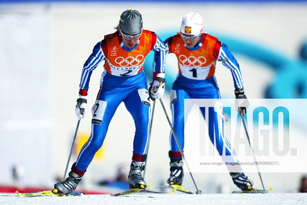 OLYMPIC LEGENDS: Larissa Lasutina Larissa Lazutina (li.) wird verfolgt von Olga Danilova (beide Russland) Nordischer Skilauf OS Winter Damen Olympische Winterspiele 2002, Olympia, Olympiade, Spiele, Ski Nordisch, Nordischer Skisport Gruppe Soldier Hollow Salt Lake City Utah Dynamik,