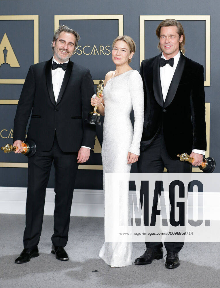 (L-R) Joaquin Phoenix, winner of Best Actor in a Leading Role for Joker, Renée Zellweger, winner of Best Actress in a Leading Role for Judy, and Brad Pitt, winner of Best Actor in a Supporting Role for Once Upon A Time In Hollywood, appear backstage with their Oscars during the 92nd annual Academy Awards at Loews Hollywood Hotel in the Hollywood section of Los Angeles on Sunday, February 9, 2020. LAP20200209859 JOHNxANGELILLO
