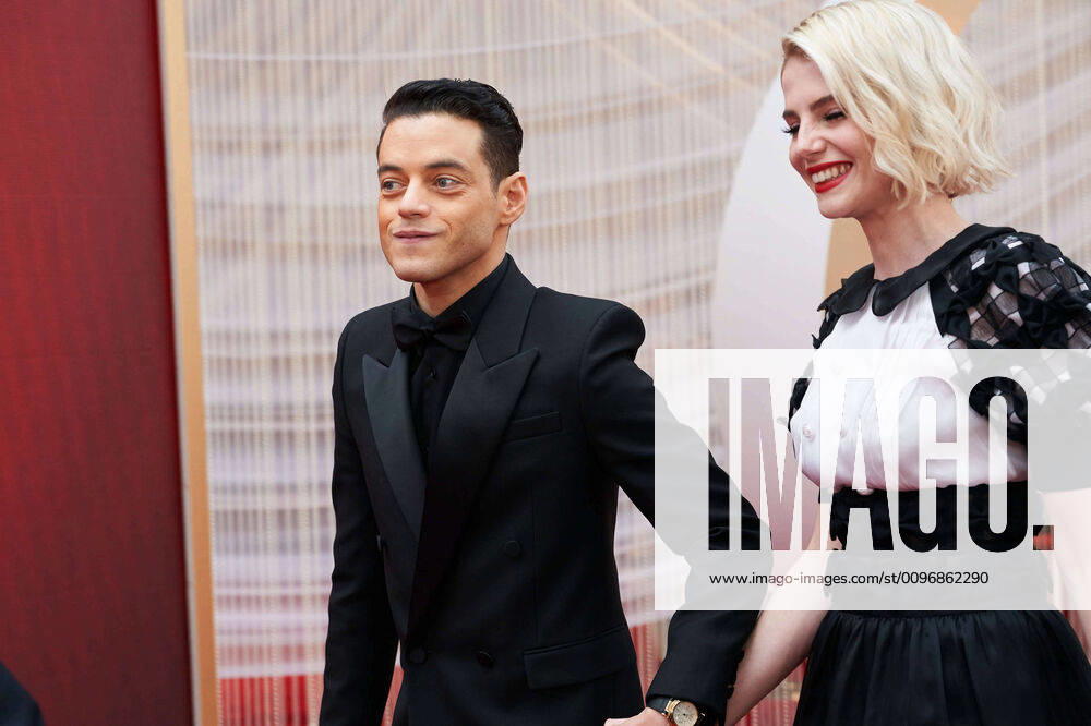Rami Malek and Lucy Boynton arrive on the red carpet of The 92nd OscarsÂ® at the DolbyÂ® Theatre in Hollywood, CA on Sunday, February 9, 2020. Los Angeles CA USA