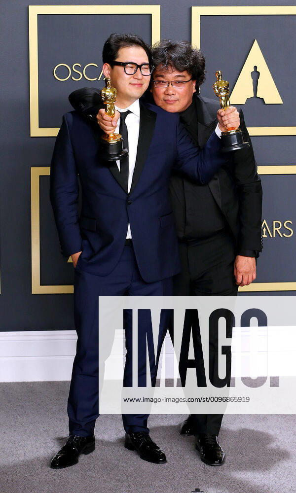 HOLLYWOOD, CA - FEBRUARY 9:Bong Joon-ho, Han Jin-won pose in the press room during the 92nd Annual Academy Awards at Loews Hollywood Hotel on February 9, 2020 in Hollywood, California. Photo: Christopher Victorio imageSPACE Hollywood USA - ZUMAs181 20200209_zea_s181_309