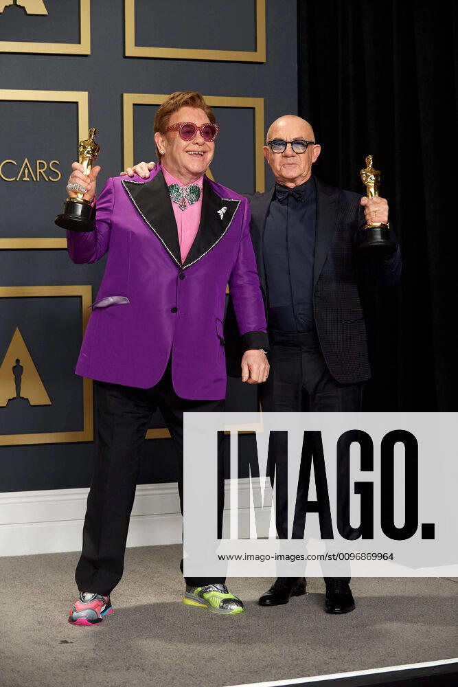 Elton John and Bernie Taupin pose backstage with the Oscar for Original Song during the live ABC Telecast of The 92nd Oscars at the Dolby Theatre in Hollywood, CA on Sunday, February 9, 2020. Los Angeles CA USA
