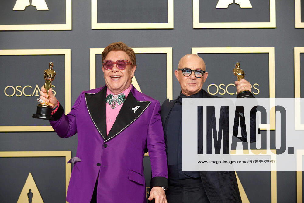 Elton John and Bernie Taupin pose backstage with the Oscar for Original Song during the live ABC Telecast of The 92nd Oscars at the Dolby Theatre in Hollywood, CA on Sunday, February 9, 2020. Los Angeles CA USA