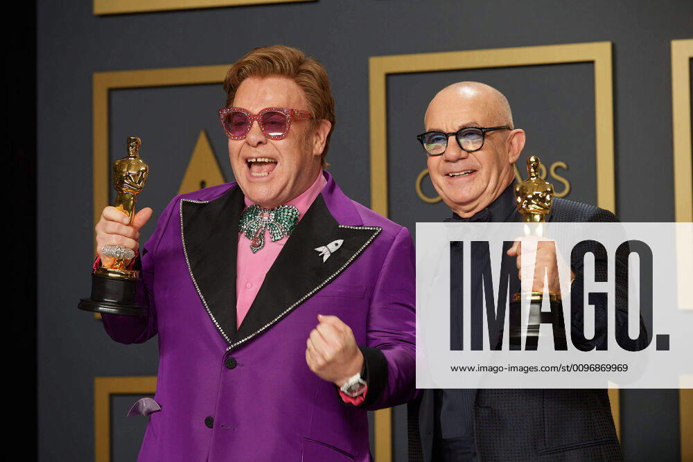 Elton John and Bernie Taupin pose backstage with the Oscar for Original Song during the live ABC Telecast of The 92nd Oscars at the Dolby Theatre in Hollywood, CA on Sunday, February 9, 2020. Los Angeles CA USA