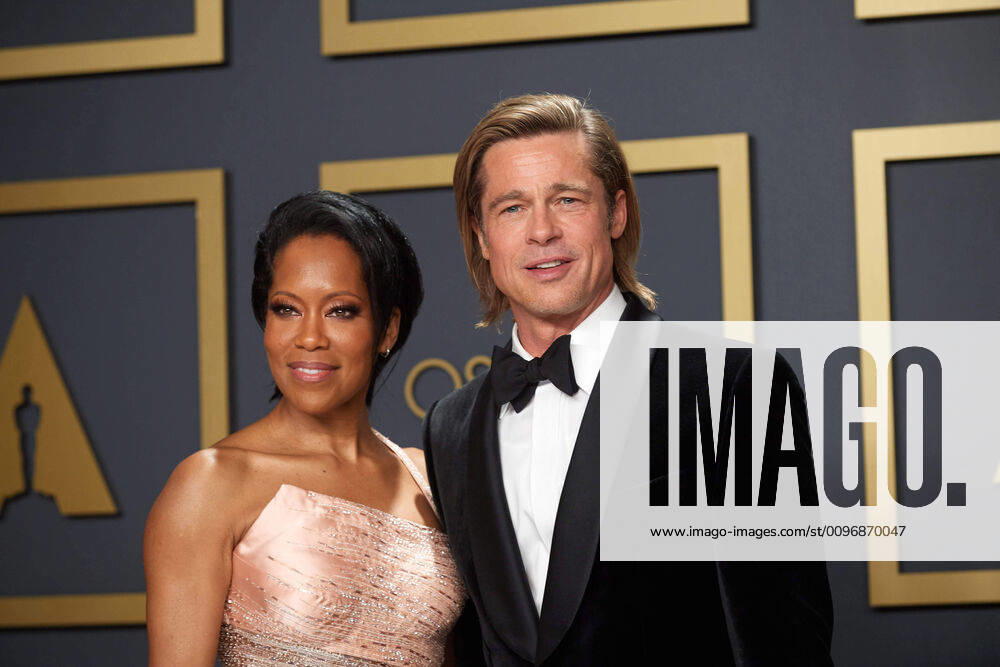 Regina King and Brad Pitt pose backstage with the Oscar for Actor In A Supporting Role during the live ABC Telecast of The 92nd Oscars at the Dolby Theatre in Hollywood, CA on Sunday, February 9, 2020. Los Angeles CA USA