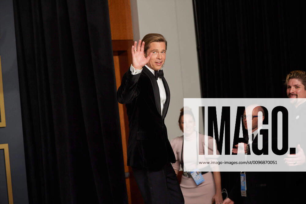 Brad Pitt waves backstage with the Oscar for Actor In A Supporting Role during the live ABC Telecast of The 92nd Oscars at the Dolby Theatre in Hollywood, CA on Sunday, February 9, 2020. Los Angeles CA USA