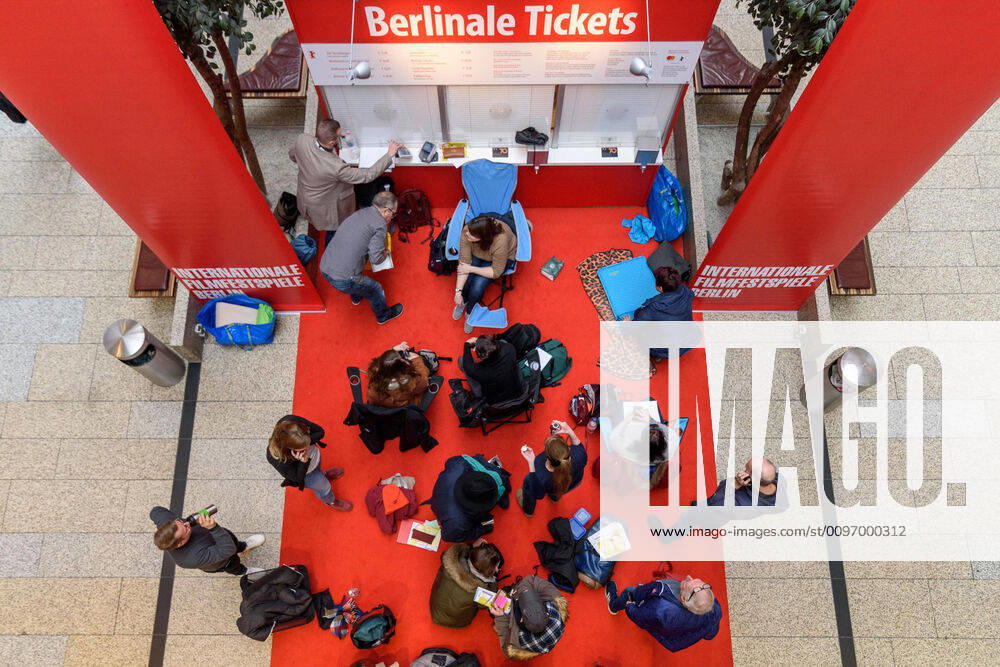 Start of ticket sales in the Potsdamer Platz Arkaden for the upcoming 70 Berlin International Film Festival Some cinema fans spent the night in front of the ticket counter snapshot photography F Boillot