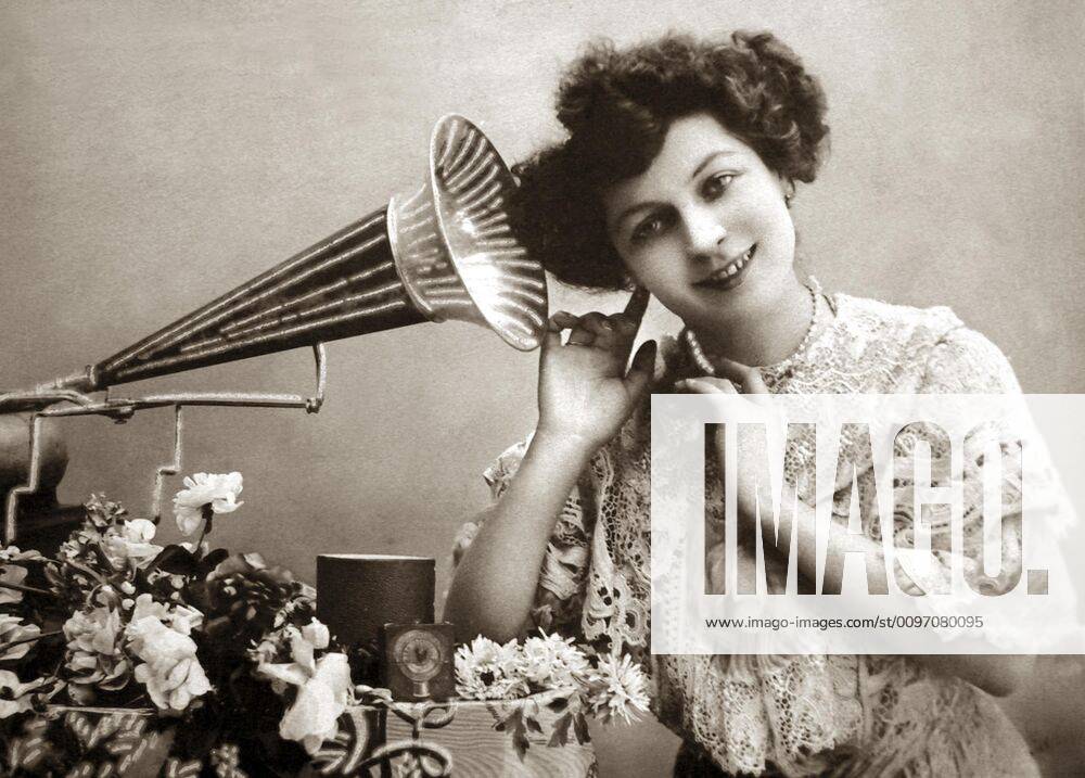 Woman listening to music with gramophone, 1910s, Germany, Europe
