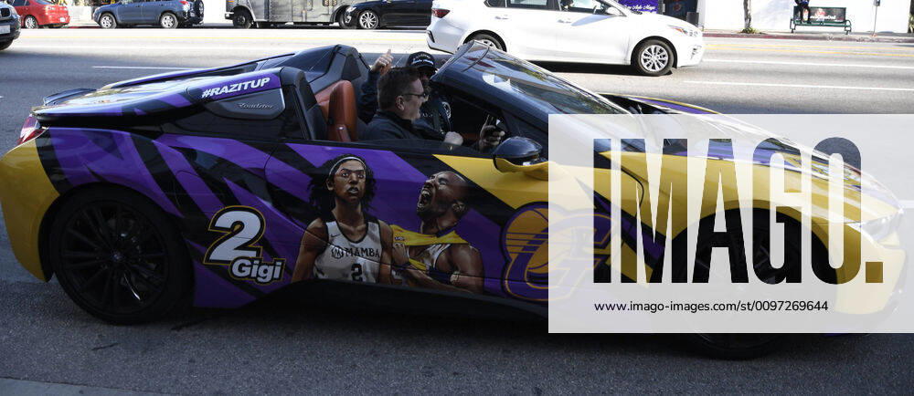 Sherman Oaks residents Yanni Raz drives around in his BMW all Laker Kobe rap out design job for the thousands of Laker fans arriving for the Kobe and Gianna Bryant memorial outside Staples Monday Feb 24,2020. Los Angele CA USA, Los Angeles USA - ZUMAbl1_ 20200224_zaf_bl1_023