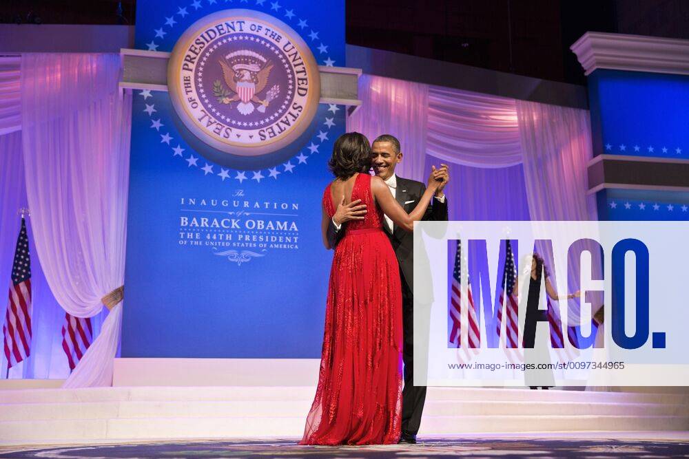 President Barack and Michelle Obama dance at the Commander in Chief Inaugural Ball. Jan 21, 2013. They danced to Let s Stay Together performed by Jennifer Hudson (right). The First Lady s red evening gown was designed by Jason Wu. (BSLOC_2015_3_48) For usage credit please use; The White House PUBLICATIONXNOTxINxCANxCHNxFRAxITAxJPNxNORxPOLxRUSxESPxUKxUSA