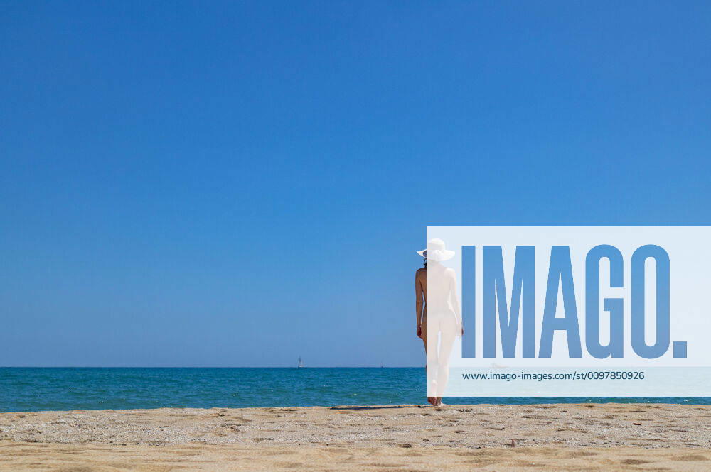 Young girl on nude beach in Spain Arenys de Mar, CT, Spain ,model released, Symbolfoto CR_APWV200116-292539-01