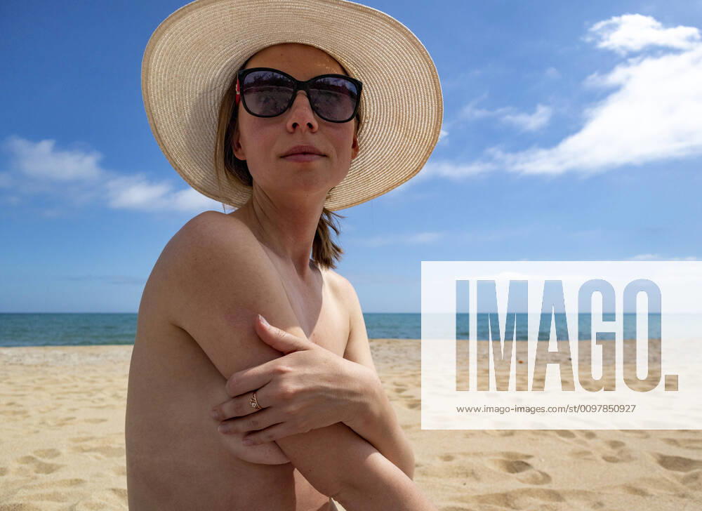 Young girl on nude beach in Spain Arenys de Mar, CT, Spain ,model released, Symbolfoto CR_APWV200116-292541-01