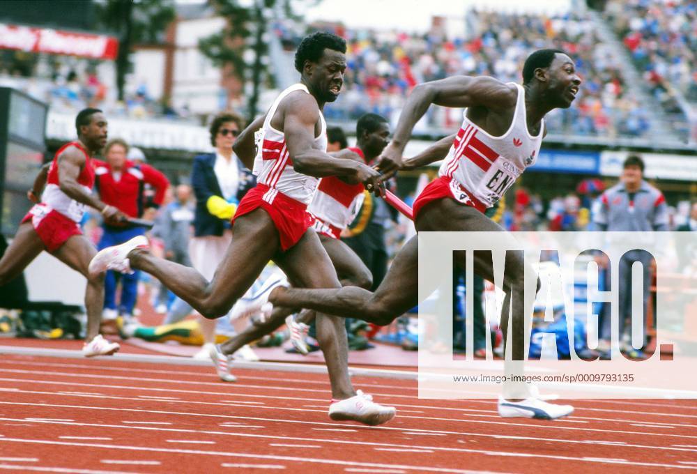 Athletics - 1986 Edinburgh Commonwealth Games - Men s 4 x 100m Relay final England s Mike McFarlane hands over the baton to Clarence Callender. Meadowbank Stadium, Edinburgh, Scotland