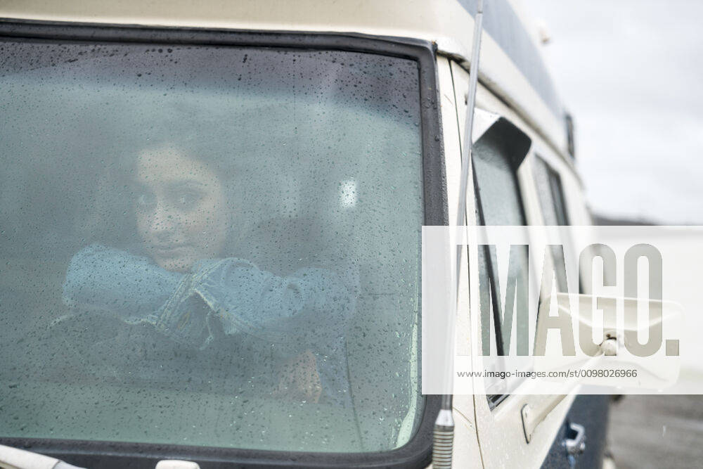 Portrait of teenage girl behind wheel of vintage van United States, Washington, Bellingham ,model released, Symbolfoto CR_FGUQ200206E-301044-01