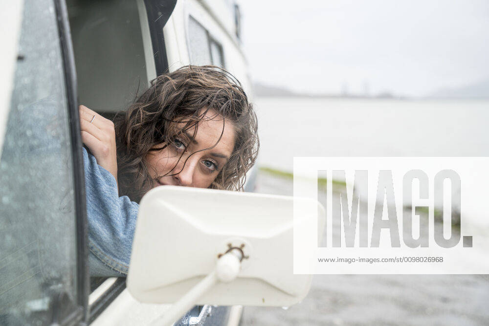 Portrait of teenage girl behind wheel of vintage van United States, Washington, Bellingham ,model released, Symbolfoto CR_FGUQ200206E-301045-01