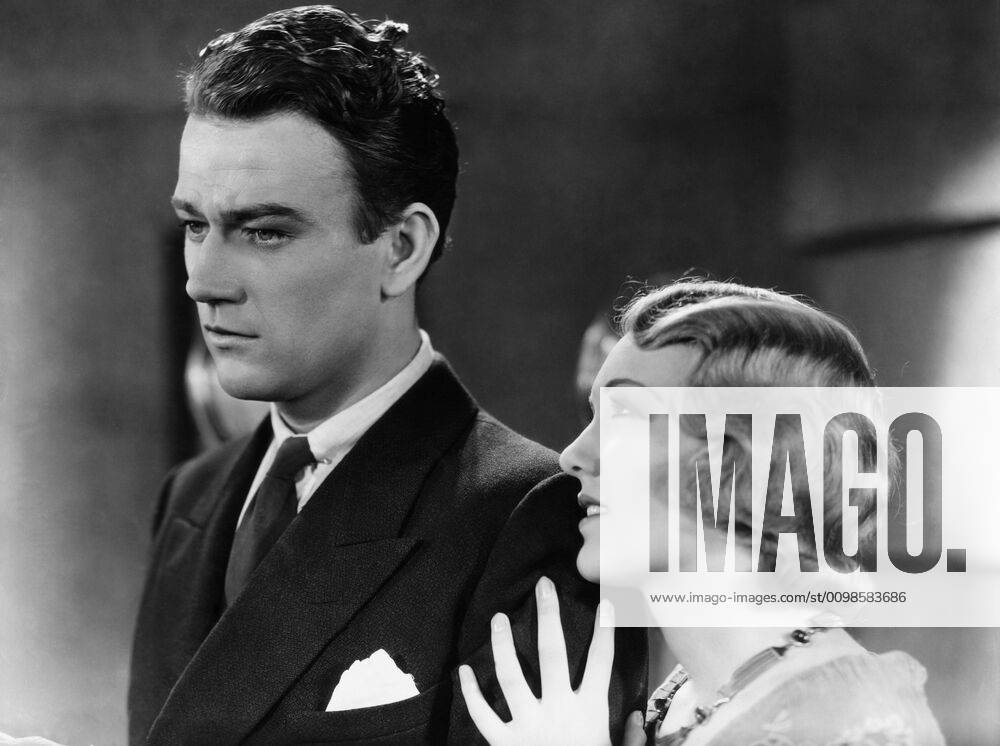 GIRLS DEMAND EXCITEMENT, John Wayne, Virginia Cherrill, 1931, TM and copyright 20th Century Fox Film Corp. All rights reserved Courtesy: Everett Collection. 20thCentFox Courtesy Everett Collection !ACHTUNG AUFNAHMEDATUM GESCHÄTZT! PUBLICATIONXNOTxINxCANxCHNxFRAxITAxJPNxNORxPOLxRUSxESPxUKxUSA