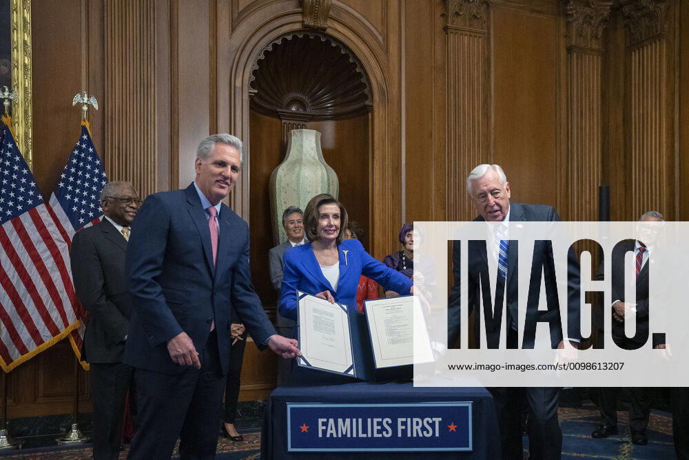 House Minority Leader Kevin McCarthy, Speaker of the House Nancy Pelosi, and House Majority Leader Steny Hoyer display the signed bill after the House passed the $2.2 trillion CARES Act at the U.S. Capitol on Friday, March 27, 2020 in Washington, D.C. The stimulus bill, the largest in U.S history, provides economic bailouts to companies, independent contractors and includes direct payments to individuals as the U.S. suffers from the COVID-19 pandemic. WAP202003278043 STEFANIxREYNOLDS