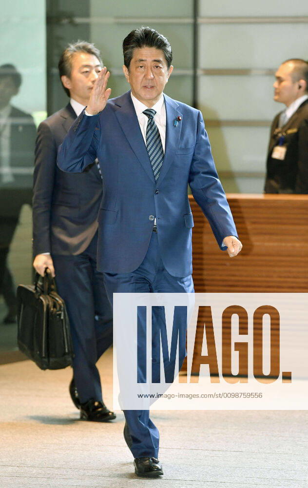 Japan PM Abe Japanese Prime Minister Shinzo Abe arrives at his office in Tokyo on March 31, 2020.