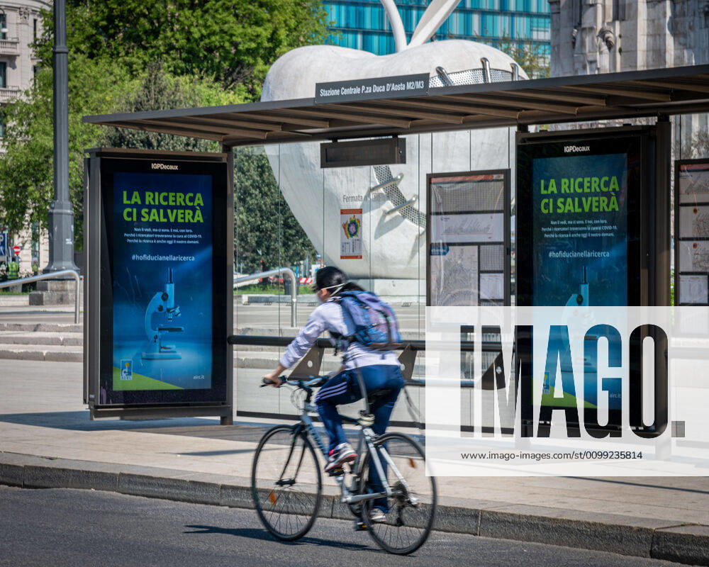 Milan - Daily life in the time of the Coronavirus. Tram stop in Piazza Duca d Aosta. Research will save us (Marco Passaro Fotogramma, Milan - 2020-04-10) p.s. la foto e utilizzabile nel rispetto del contesto in cui e stata scattata, e senza intento diffamatorio del decoro delle persone rappresentate