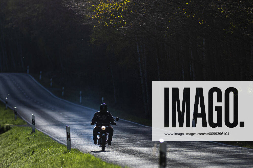 A Simson S50 moped drives along a country road in Diehsa, 14 04 2020 Diehsa Germany
