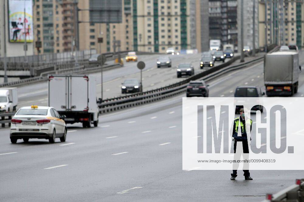 Russia. Moscow amid self-isolation regime. The Russian government has extended the period off work with full pay until April 30 nationwide to counter the spread of the COVID-19 infection. From April 15, a total check on the presence of special passes for car drivers and their passengers will be carried out at the entrances to Moscow and in the capital itself. Traffic police officers inspect the entrance passes to Moscow. DmitryxGolubovich