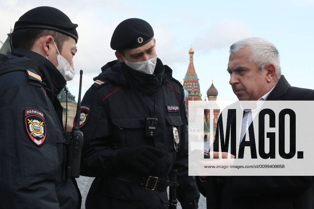 Police officers check a man s documents in Red Square. Since 30 March 2020, Moscow has been on lockdown. Earlier, the Russian government announced a paid period off work for employed people and school holidays, which are expected to last till the end of April. On 13 April 2020, the Moscow government introduced a digital permit system aimed at further movement restrictions; from April 15, people need to apply for digital permits to travel on public transport or a personal vehicle around the city. As of 15 April 2020, Russia has reported more 24,500 confirmed cases of the novel coronavirus infection, with more than 14,800 confirmed cases in Moscow. Sergei Savostyanov TASS TS0D5E45