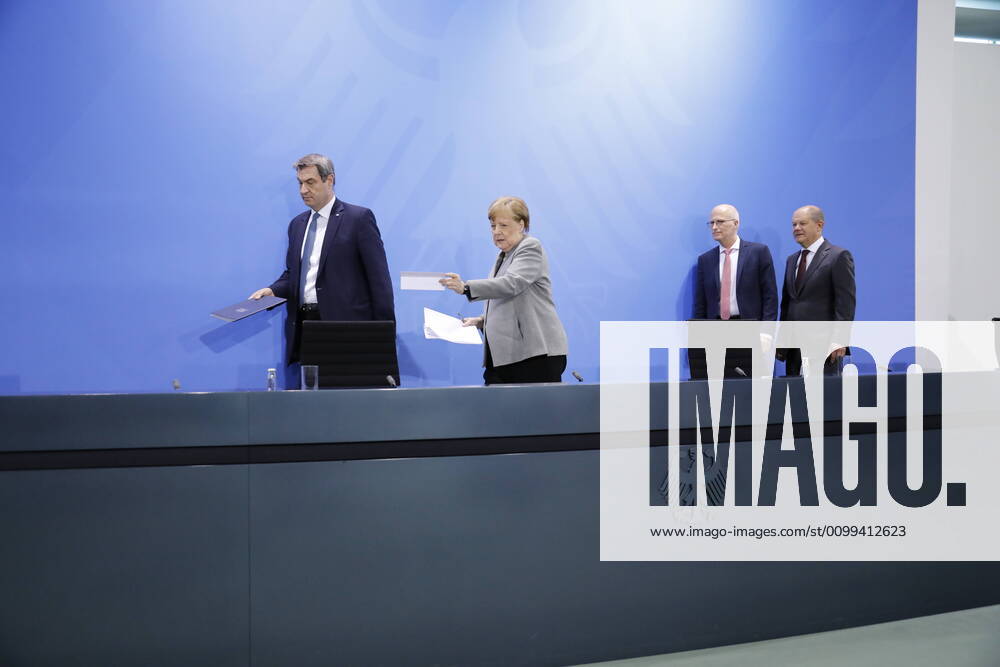 Markus Söder, Bavarian Prime Minister, Chancellor Angela Merkel, Peter Tschentscher, First Mayor of the Free and Hanseatic City of Hamburg, Olaf Scholz, Vice-Chancellor and Minister of Finance of the Federal Republic of Germany, Germany, Berlin, Federal Chancellery, Press conference by Chancellor Merkel following the discussion with the heads of government of the Länder in connection with the corona viru