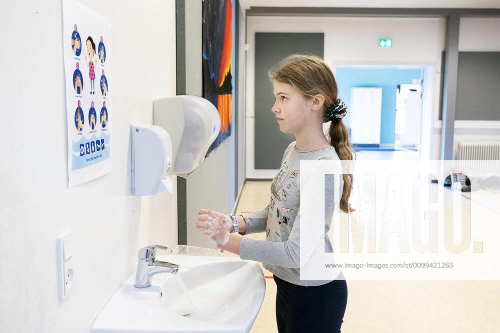When the children meet, they must start by washing their hands Toelloese School in Holbaek Municipality welcomes the first pupils after reopening, Thursday, April 16, 2020, Toelloese Denmark,