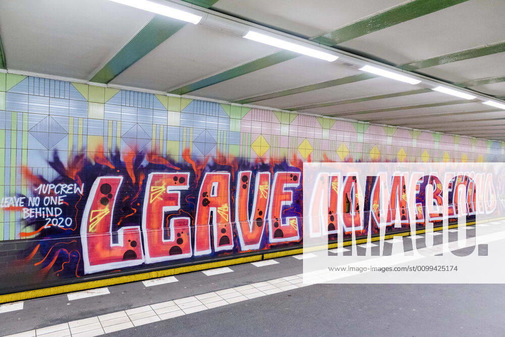 A large graffiti by the artist group 1UP with the text Leave no one behind can be seen on the wall of the underground station KurfuerstenstraoŸe in Berlin. The hashtag used is recalling the debate about the politics, practices and events surrounding the European border regime and about migration movements and is often used by groups advocating humanitarian rights for refugees. - ZUMAs172 20200416_zap_s172_001