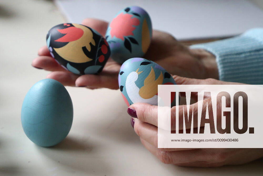 Wooden Easter eggs painted Gorodets-style by Iya Tokareva at her home studio; Gorodets painting, one of the traditional Russians handicrafts, originated in the middle of XIX century in the town of Gorodets, the Nizhny Novgorod Region. Anton Novoderezhkin TASS TS0D5FE8