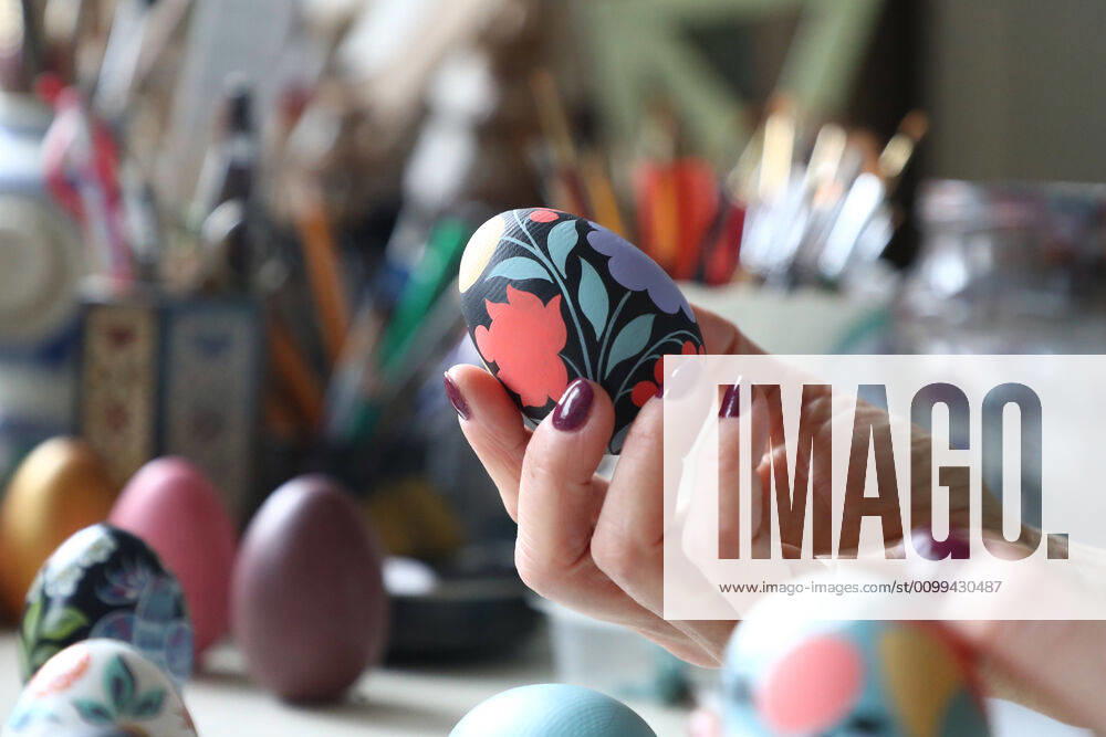 Wooden Easter eggs painted Gorodets-style by Iya Tokareva at her home studio; Gorodets painting, one of the traditional Russians handicrafts, originated in the middle of XIX century in the town of Gorodets, the Nizhny Novgorod Region. Anton Novoderezhkin TASS TS0D5FE9
