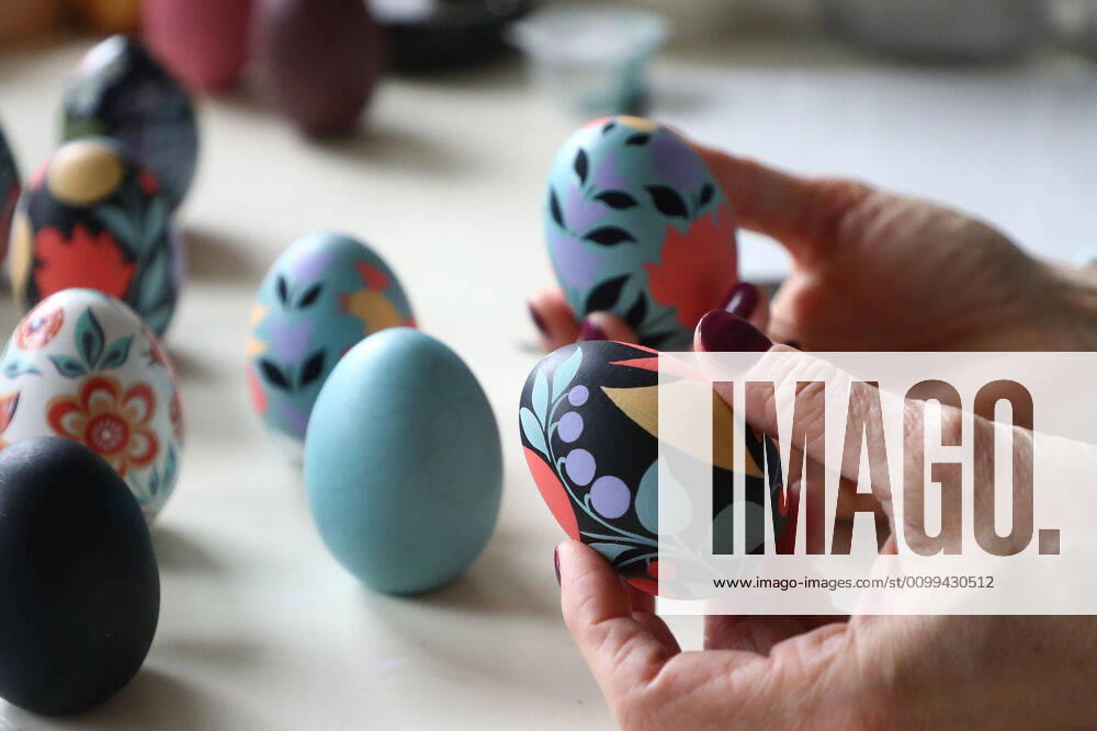 Wooden Easter eggs painted Gorodets-style by Iya Tokareva at her home studio; Gorodets painting, one of the traditional Russians handicrafts, originated in the middle of XIX century in the town of Gorodets, the Nizhny Novgorod Region. Anton Novoderezhkin TASS TS0D5FF2