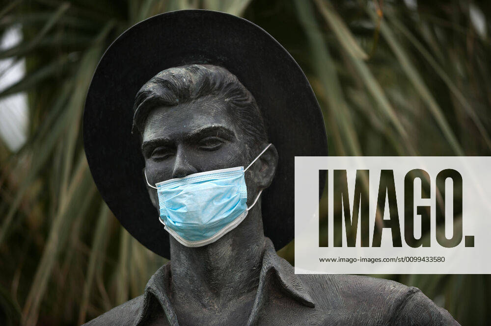 The statue of Cenachero is seen wearing a face mask as a way of raising awareness, during the covid-19 crisis..Following the confinement decreed by the Spanish government and will extended until 10th May, people are confinement in their homes causing an exceptional situation of unusual urban scenes such as empty streets. Malaga Spain - ZUMAs197 20200416_zaa_s197_046