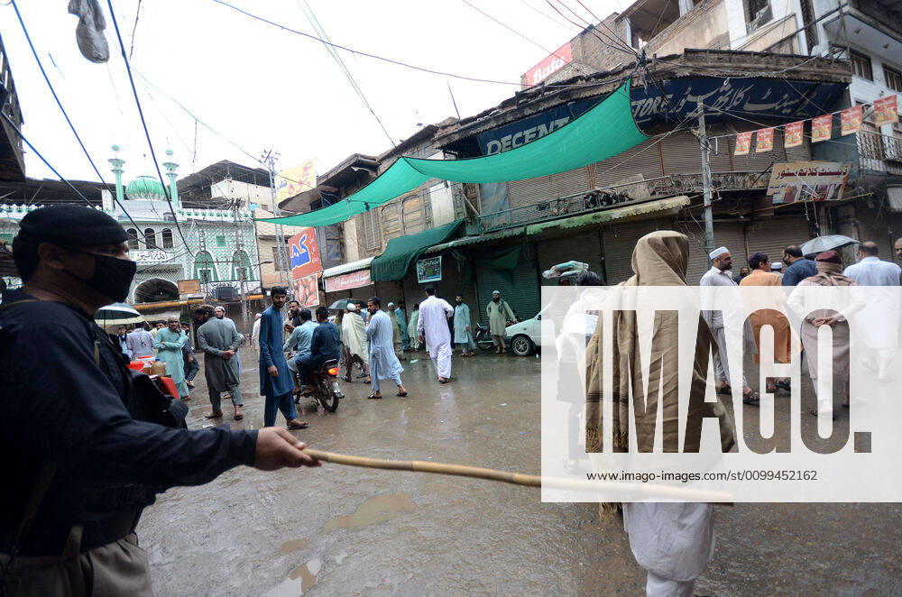 Pakistan: Police arrest people during lockdown Police arrest people during lockdown against government measures to stop the spread of corona virus. Peshawar khyber pakhtunkhwa Pakistan