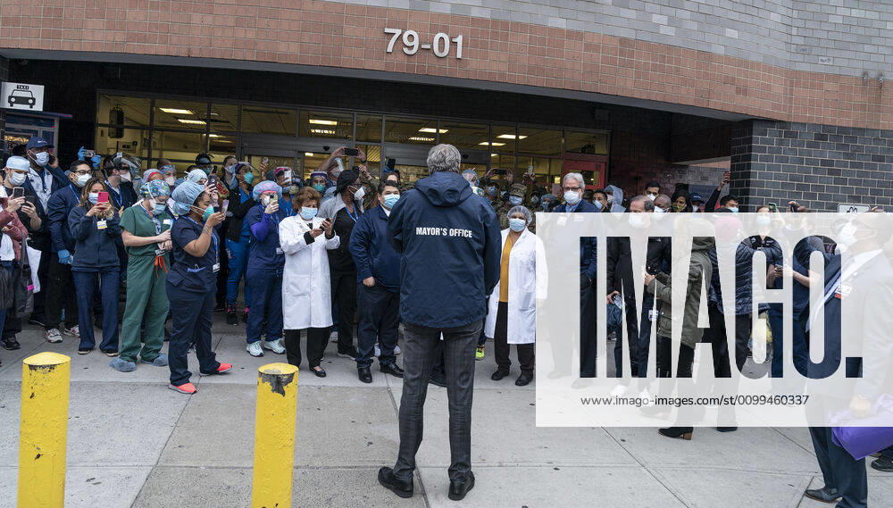 Mayor thanks medical staff at Elmhurst Hospital New York City Mayor Bill de Blasio addresses medical staff at 7pm to thank for their work during COVID-19 pandemic at Elmhurst Hospital New York New York United States