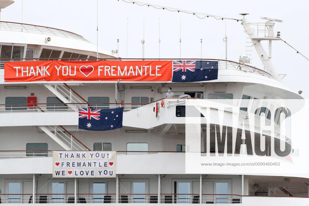 ARTANIA CRUISE SHIP DEPARTURE, A crew member looks on as the cruise ship Artania prepares to depart Fremantle harbour on Saturday, April 18, 2020. The MV Artania arrived in Fremantle over three weeks ago and a reported 79 crew and passengers have tested poitive for coronavirus. Two crew members and one passenger have died from the virus. ( NO ARCHIVING, , NO USE IN BOOKS WITHOUT CONSENT PERTH WA AUSTRALIA