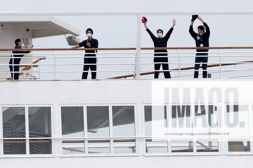 ARTANIA CRUISE SHIP DEPARTURE, Crew members on the cruise ship MV Artania are seen waving goodbye as it departs Fremantle harbour on Saturday, April 18, 2020. The MV Artania arrived in Fremantle over three weeks ago and a reported 79 crew and passengers have tested positive for coronavirus. Two crew members and one passenger have died from the virus.( NO ARCHIVING, , NO USE IN BOOKS WITHOUT CONSENT PERTH WA AUSTRALIA