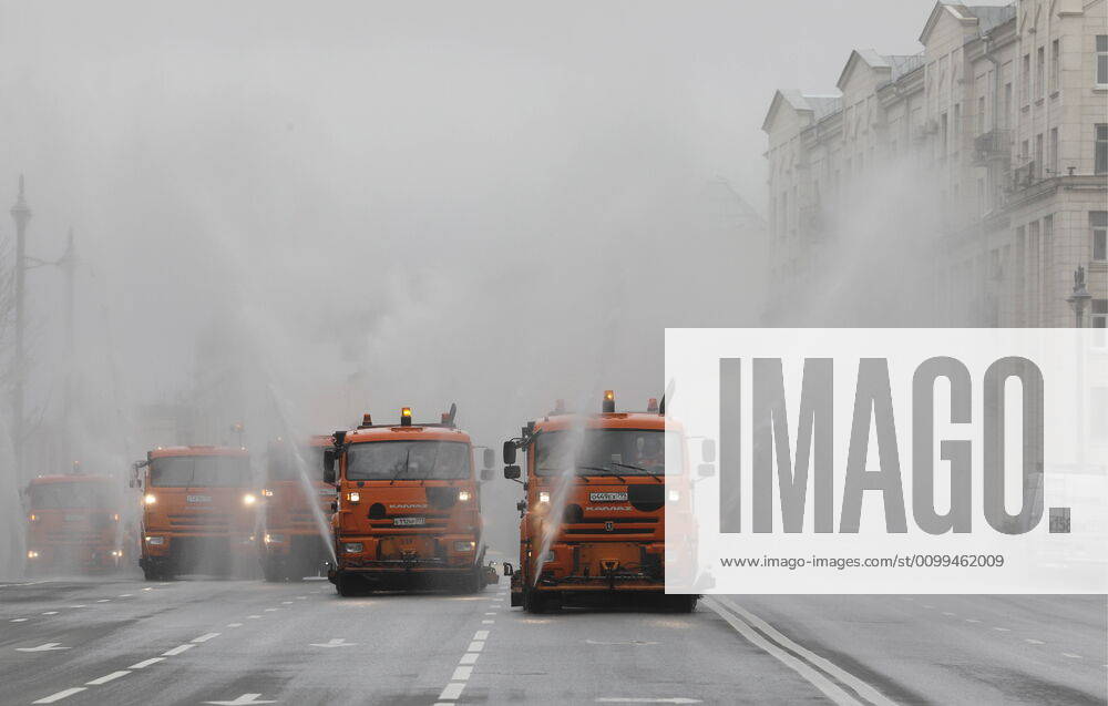 Utility machines disinfecting the pavement of Tverskaya Street with a special solution recommended by the Russian Federal Service for Surveillance on Consumer Rights Protection and Human Wellbeing (Rospotrebnadzor) amid the COVID-19 coronavirus pandemic. Alexander Shcherbak TASS TS0D62F7